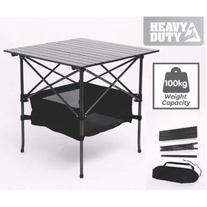 Black portable folding camping picnic table set up outdoors