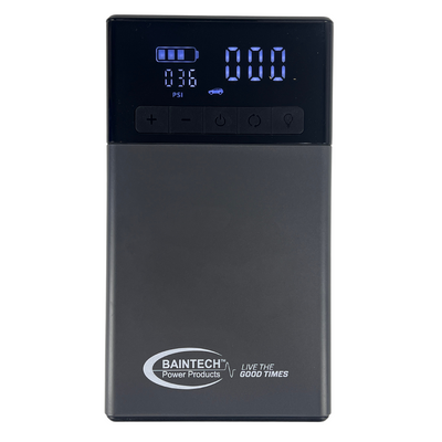 Compact emergency battery jump starter with integrated pressure gauge